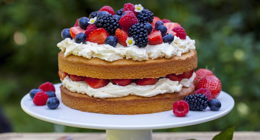 Victoria sponge with strawberries, blueberries, blackberries, raspberries