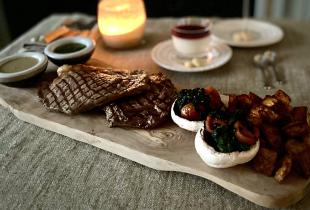 the perfect AGA steak served with potatoes 